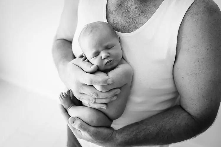warrnambool newborn photographer dad holding newborn