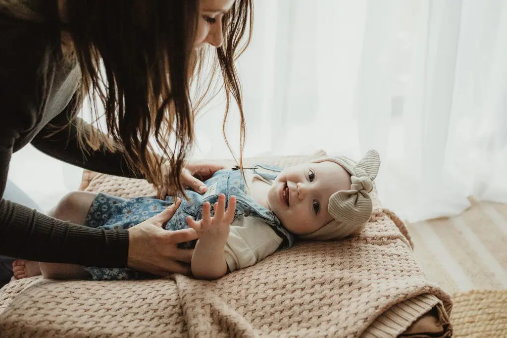 baby and mum using winow light magic photography